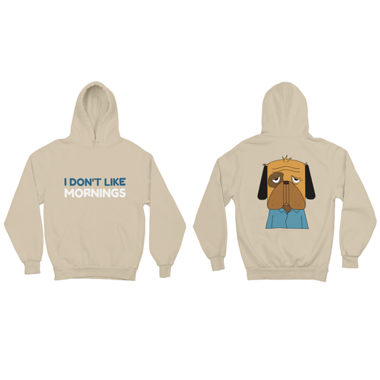 Áo hoodie be in chữ "I DON'T LIKE MORNINGS" và hình chú chó buồn ngủ mặc áo xanh – thiết kế hài hước, dễ đồng cảm.