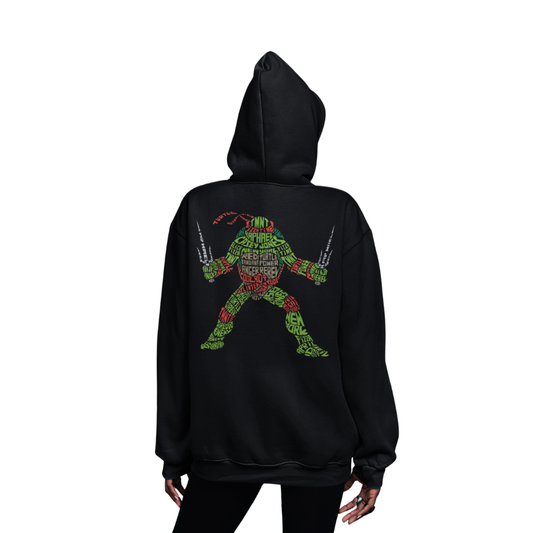 Áo thun in hình Raphael (Ninja Rùa) với kiểu chữ tạo hình độc đáo gồm các từ như “TMNT”, “Raphael”, “Red Turtle”, “Pizza”, “Anger”, “Cool Dude”.