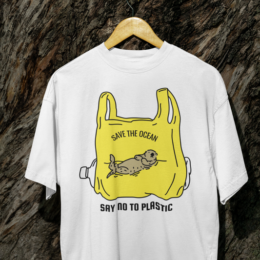 White t-shirt with a yellow plastic bag graphic and text on a textured brown background