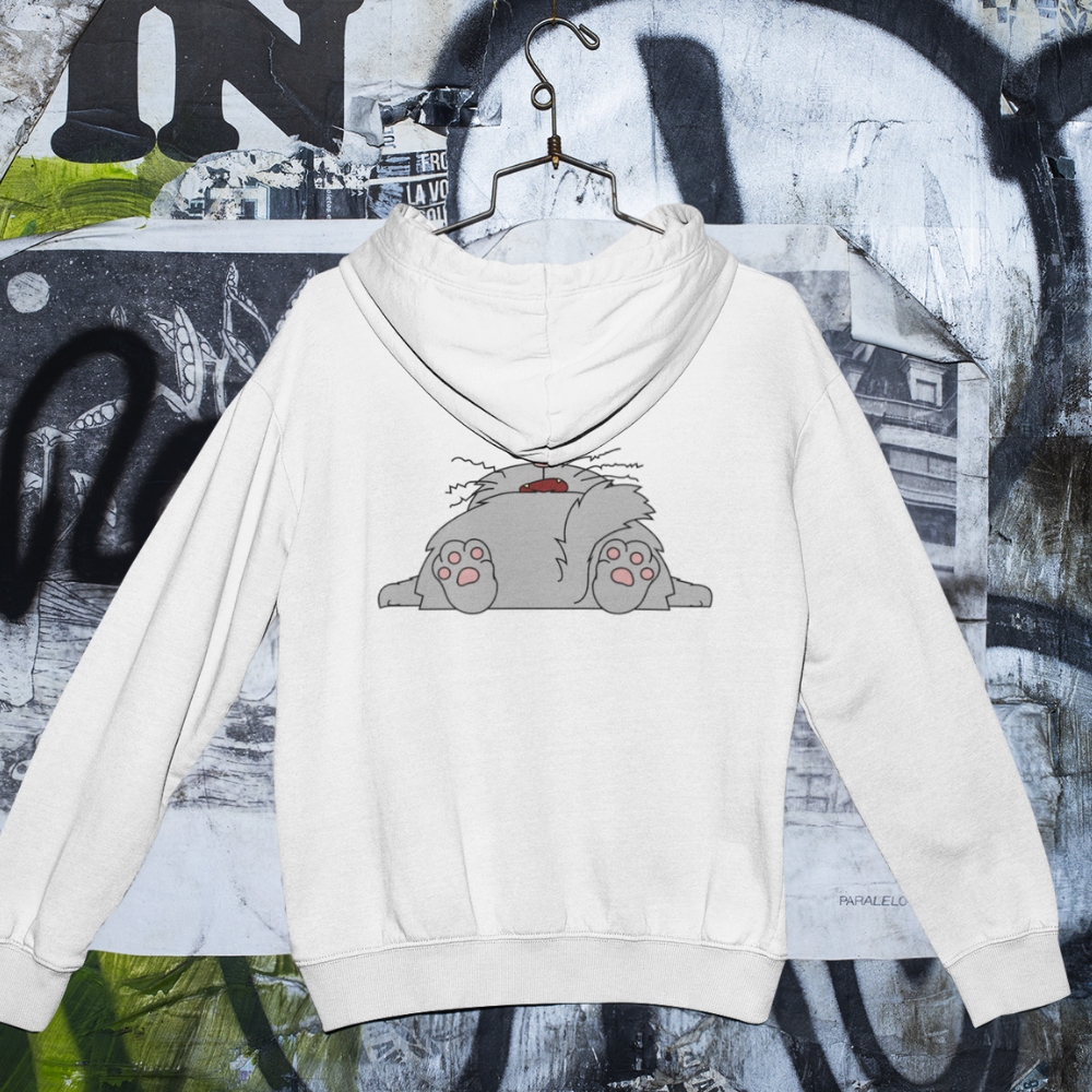 White hoodie with a cartoon character on a graffiti-covered wall