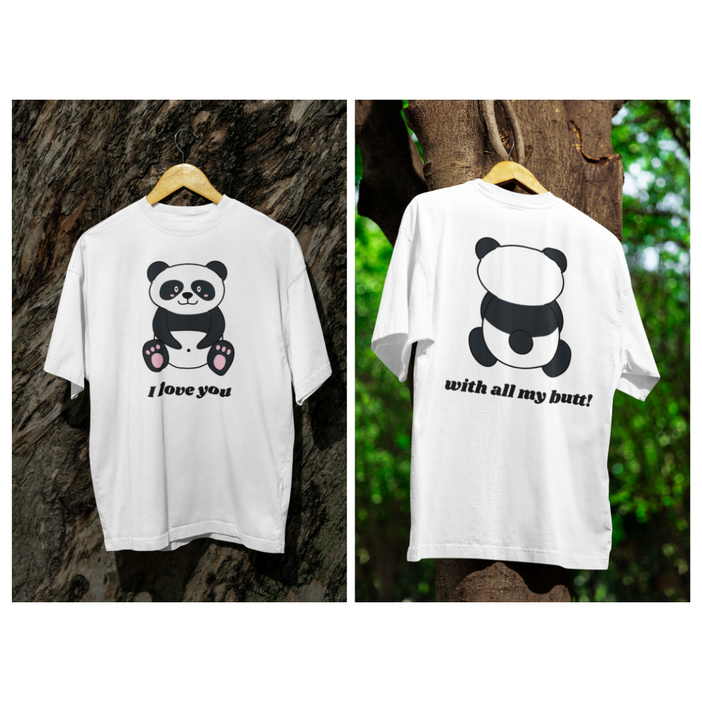 White t-shirt with panda design and text on a hanger against a natural background