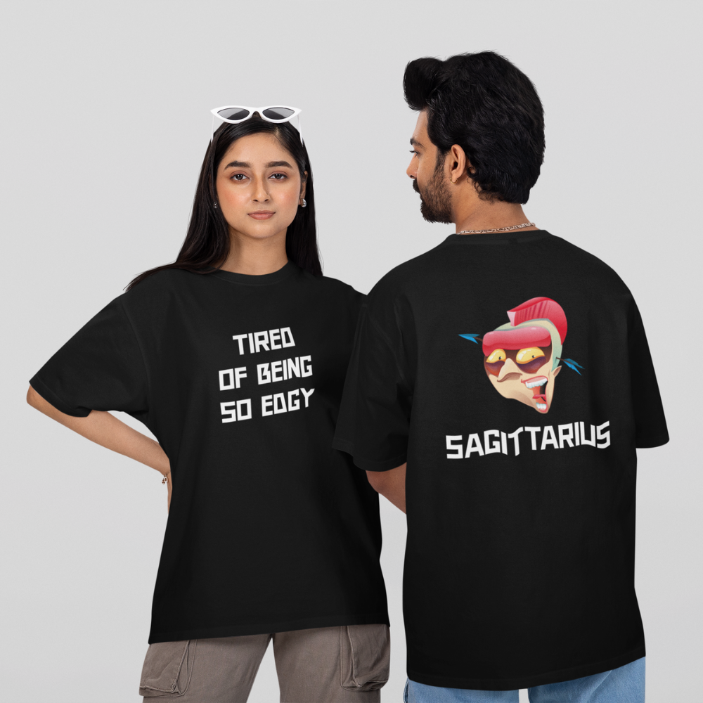 Áo hoodie/áo thun cung Sagittarius in mặt ngầu cùng câu “Tired of being so edgy” – phong cách nổi loạn, cá tính nhưng tự giễu siêu chất.