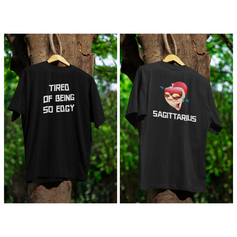 Black t-shirt with text 'TIRED OF BEING SO EDGY' on one side and 'SAGITTARIUS' with a face design on the other, against a natural background.