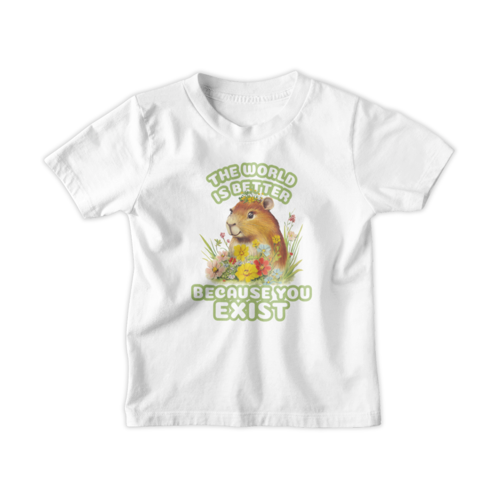 Áo thun trắng in hình capybara giữa hoa cỏ với dòng chữ The world is better because you exist
